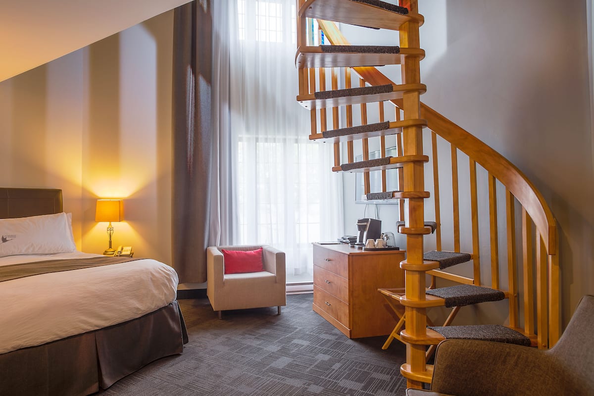 mezzanine suite, 2 queen beds, river side | egyptian cotton sheets, premium bedding, individually decorated