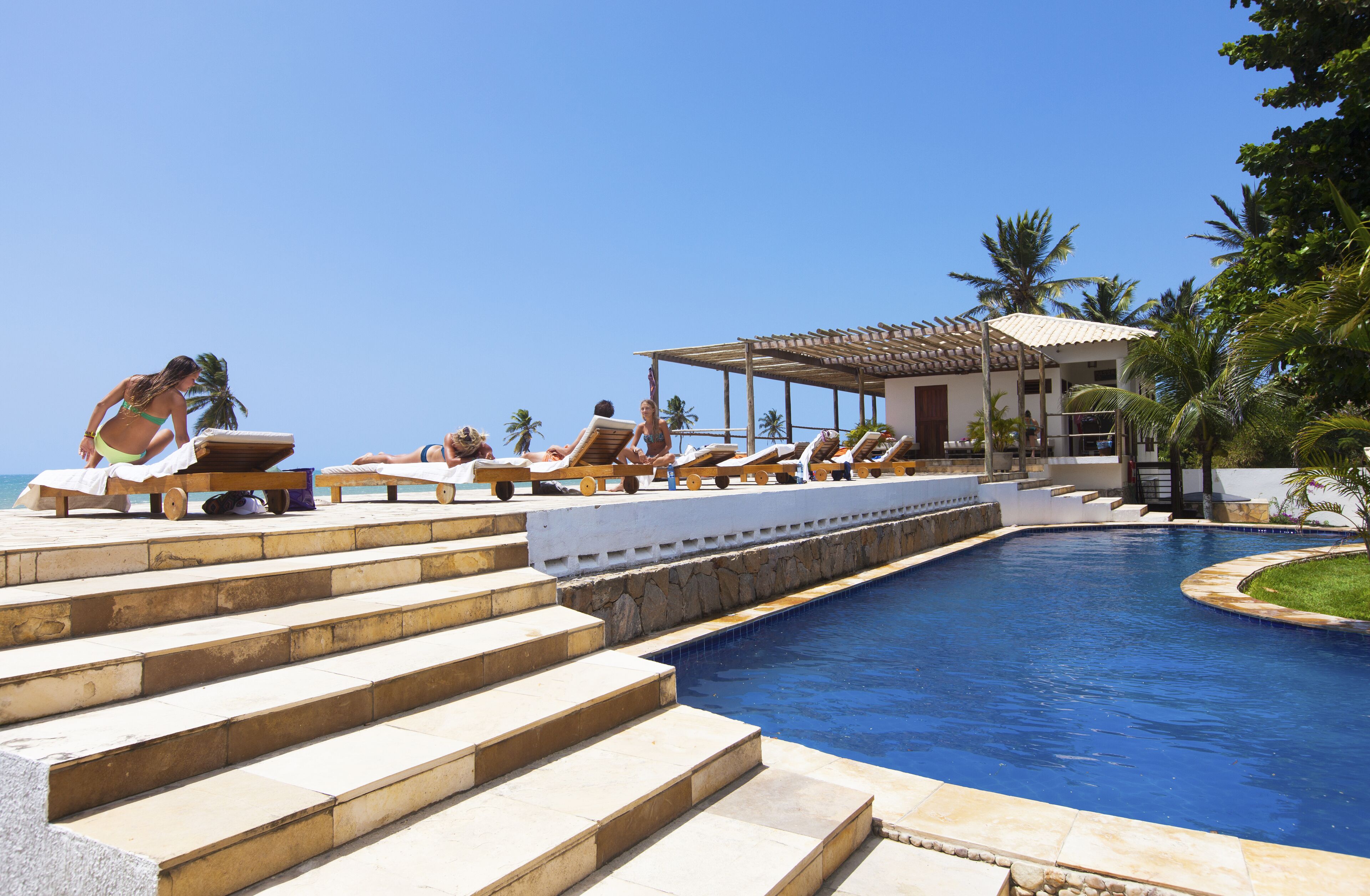 Outdoor pool, open 8:00 AM to 8:00 PM, pool loungers