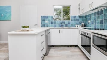 One Bedroom Garden Villa Apartment | Private kitchen | Microwave, electric kettle, toaster