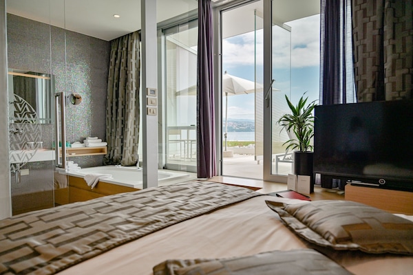 Double Room, Sea View (Small) | Bathroom | Separate tub and shower, jetted tub, rainfall showerhead