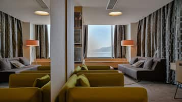 Deluxe Suite, Jetted Tub, Sea View | Living area | 48-inch flat-screen TV with cable channels, TV