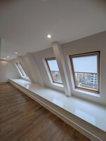 Deluxe Apartment, 3 Bedrooms | Living area | 55-inch Smart TV with digital channels, Netflix, streaming services