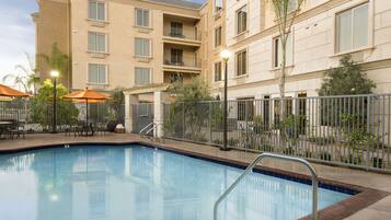 Relax by the pool surrounded by comfortable outdoor seating areas and take in the views from the hotel's balconies.