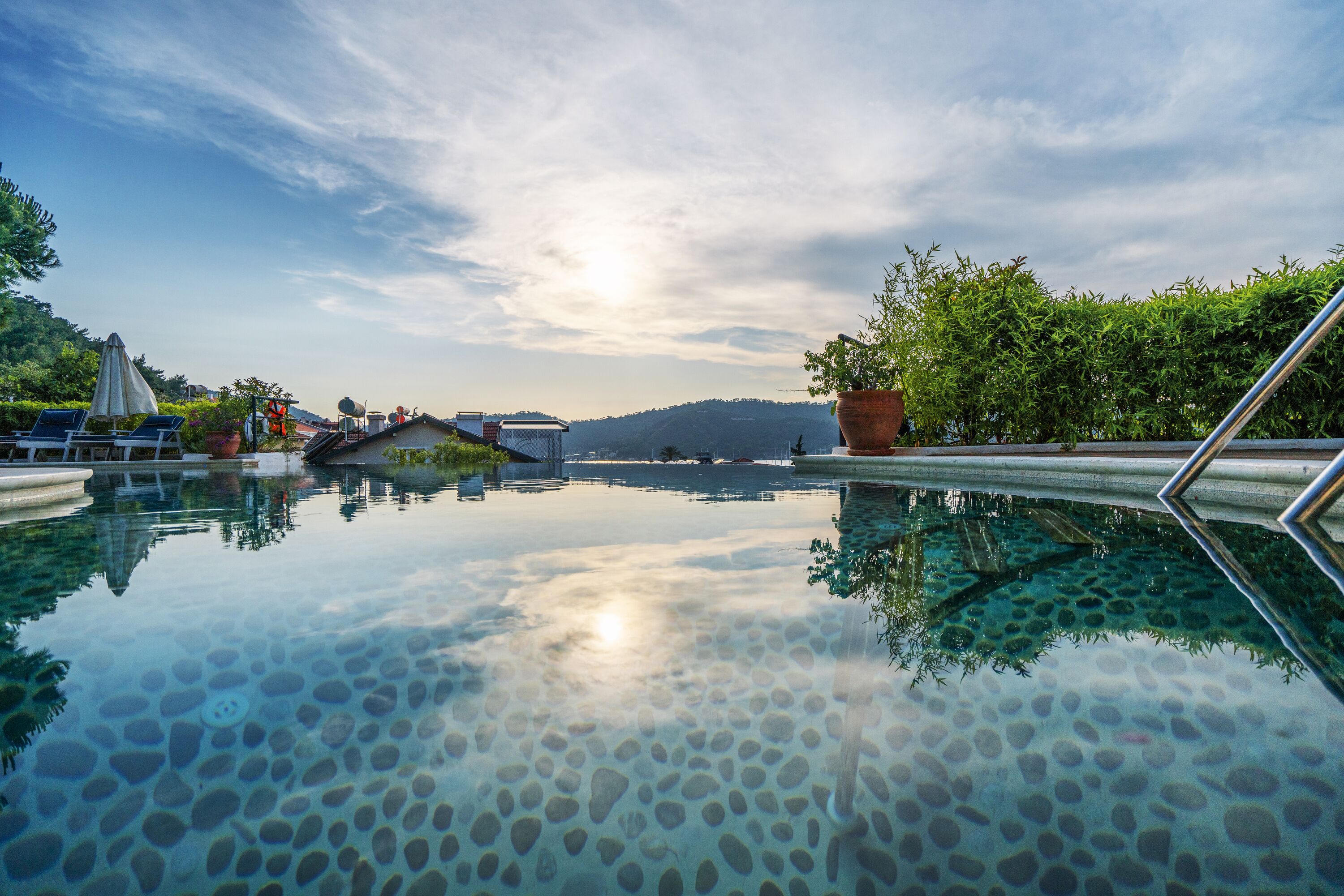 Outdoor pool, free pool cabanas, pool umbrellas