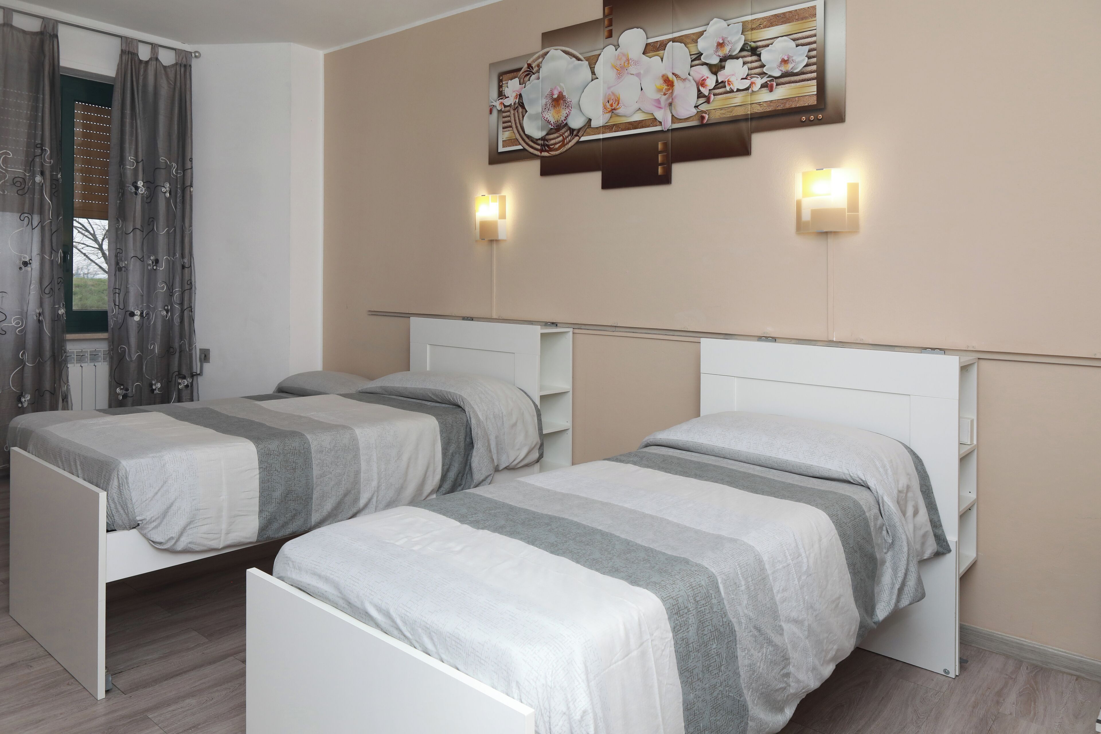 Chambre Classique avec lits jumeaux | Couette en duvet d'oie, Wi-Fi gratuit, draps fournis