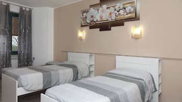 Chambre Classique avec lits jumeaux | Couette en duvet d'oie, Wi-Fi gratuit, draps fournis
