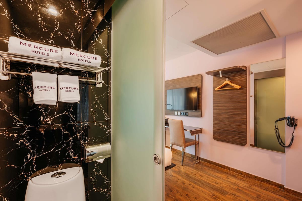 In-room safe, desk, laptop workspace, iron/ironing board