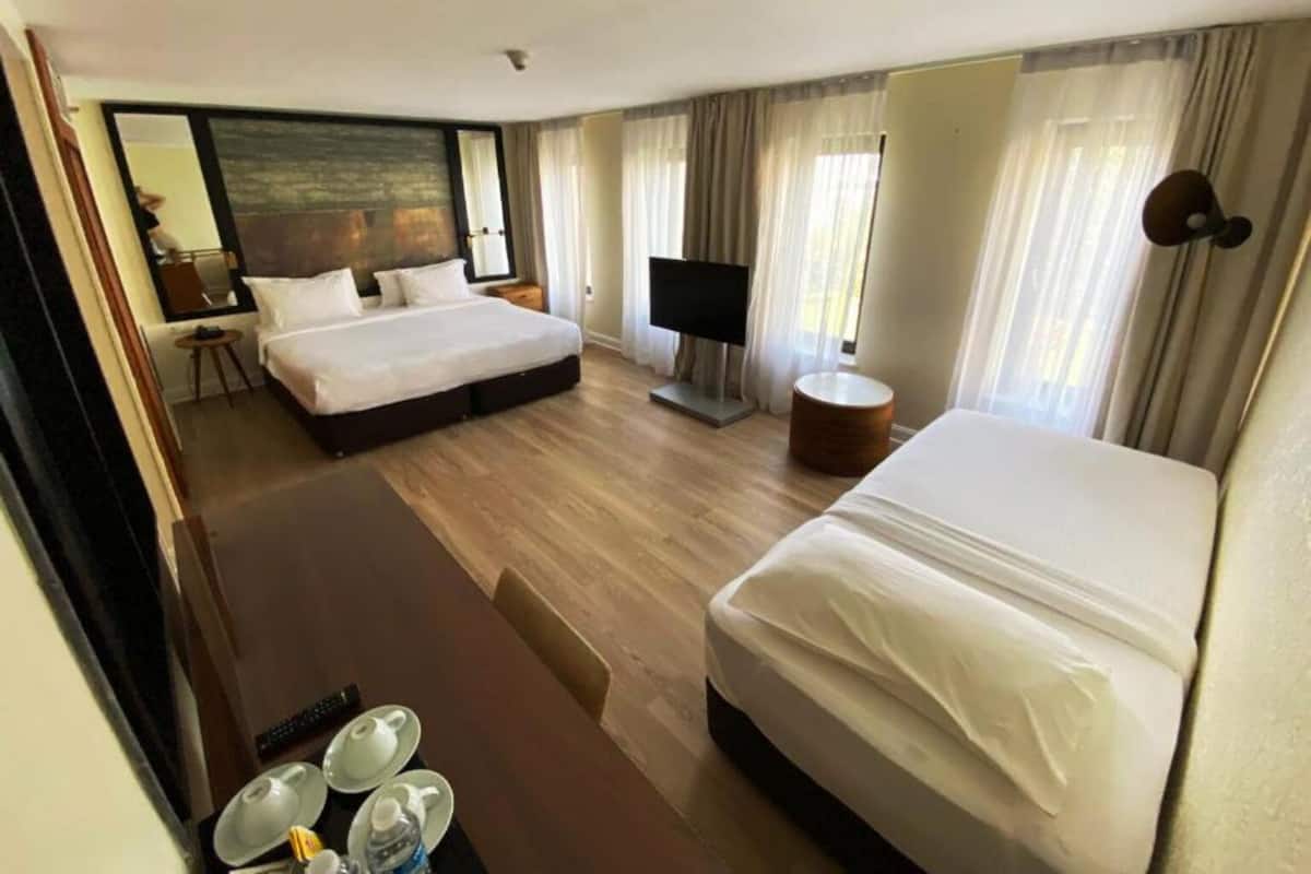 Deluxe Triple Room | 1 bedroom, premium bedding, down comforters, minibar
