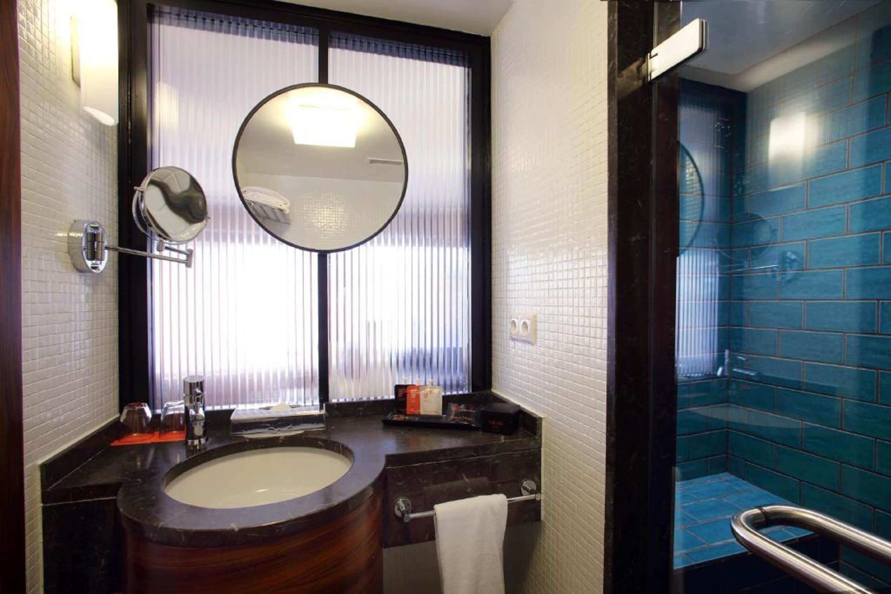 shower, rainfall showerhead, designer toiletries, hair dryer