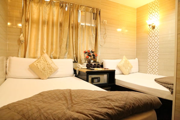 Coffres-forts dans les chambres, Wi-Fi gratuit, draps fournis