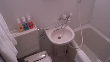 Combined shower/tub, free toiletries, hair dryer, bathrobes