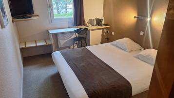 Desk, laptop workspace, blackout drapes, soundproofing