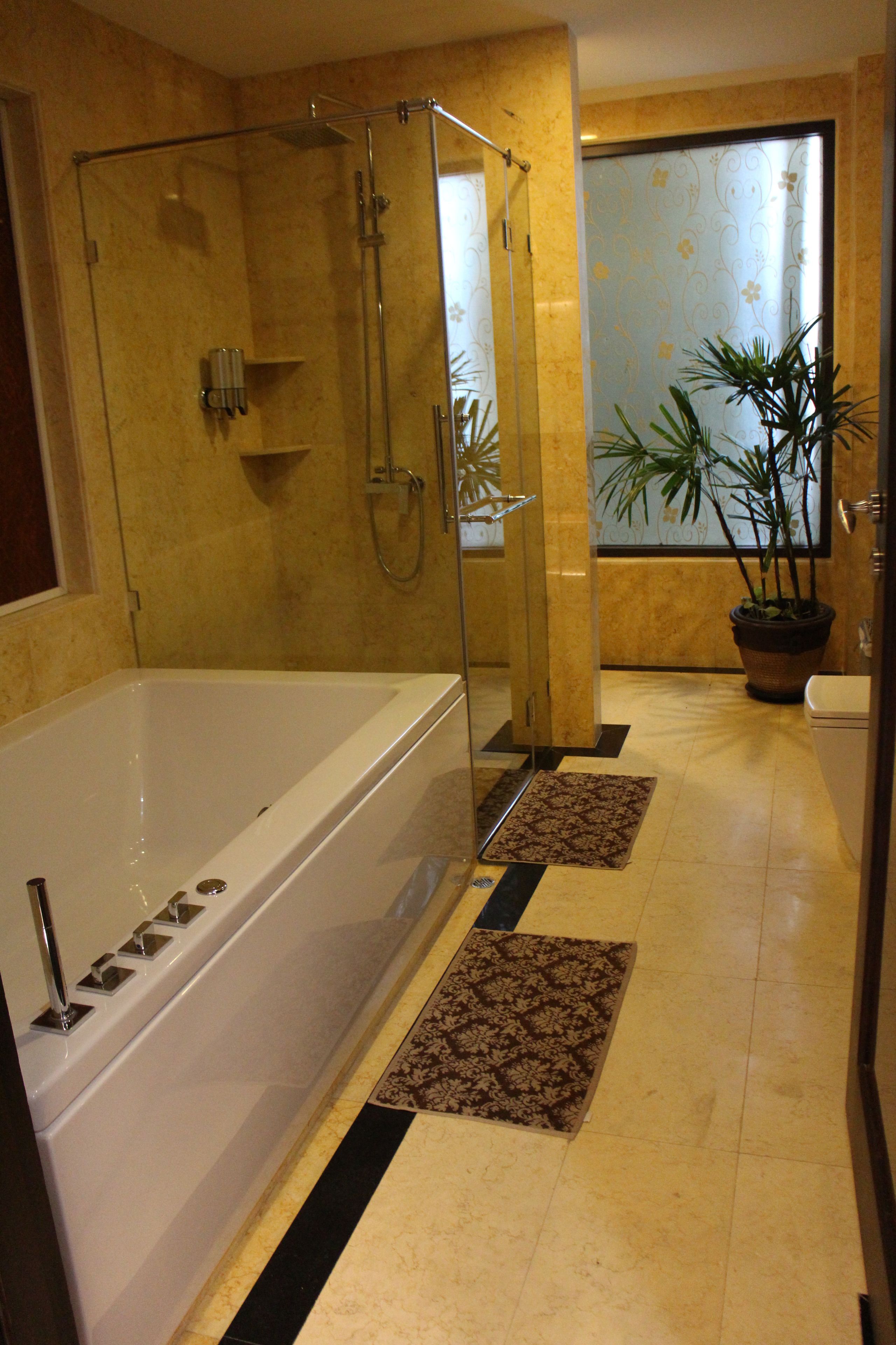 master suite vip | bathroom | separate bathtub and shower, jetted bath, rainfall showerhead