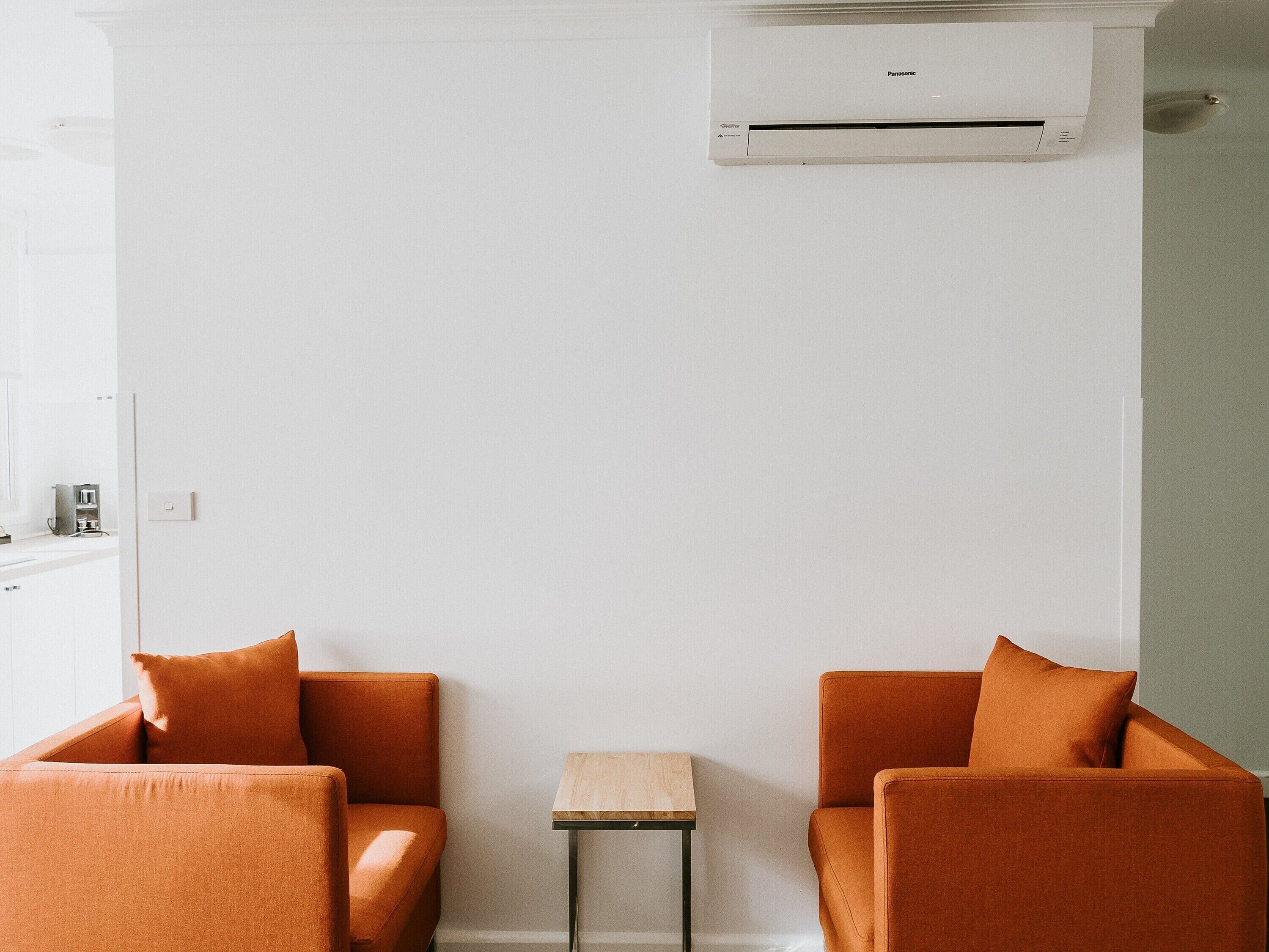 Deluxe One Bedroom Apartment | Living area | 50-inch Smart TV with premium TV channels, TV, tablet