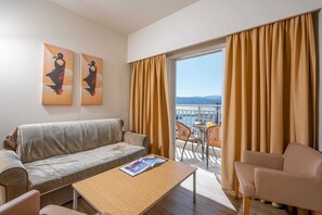 Suite, Sea View | Living area | 32-inch TV with satellite channels - Kitro Beach Hοtel (Agios Nikolaos)