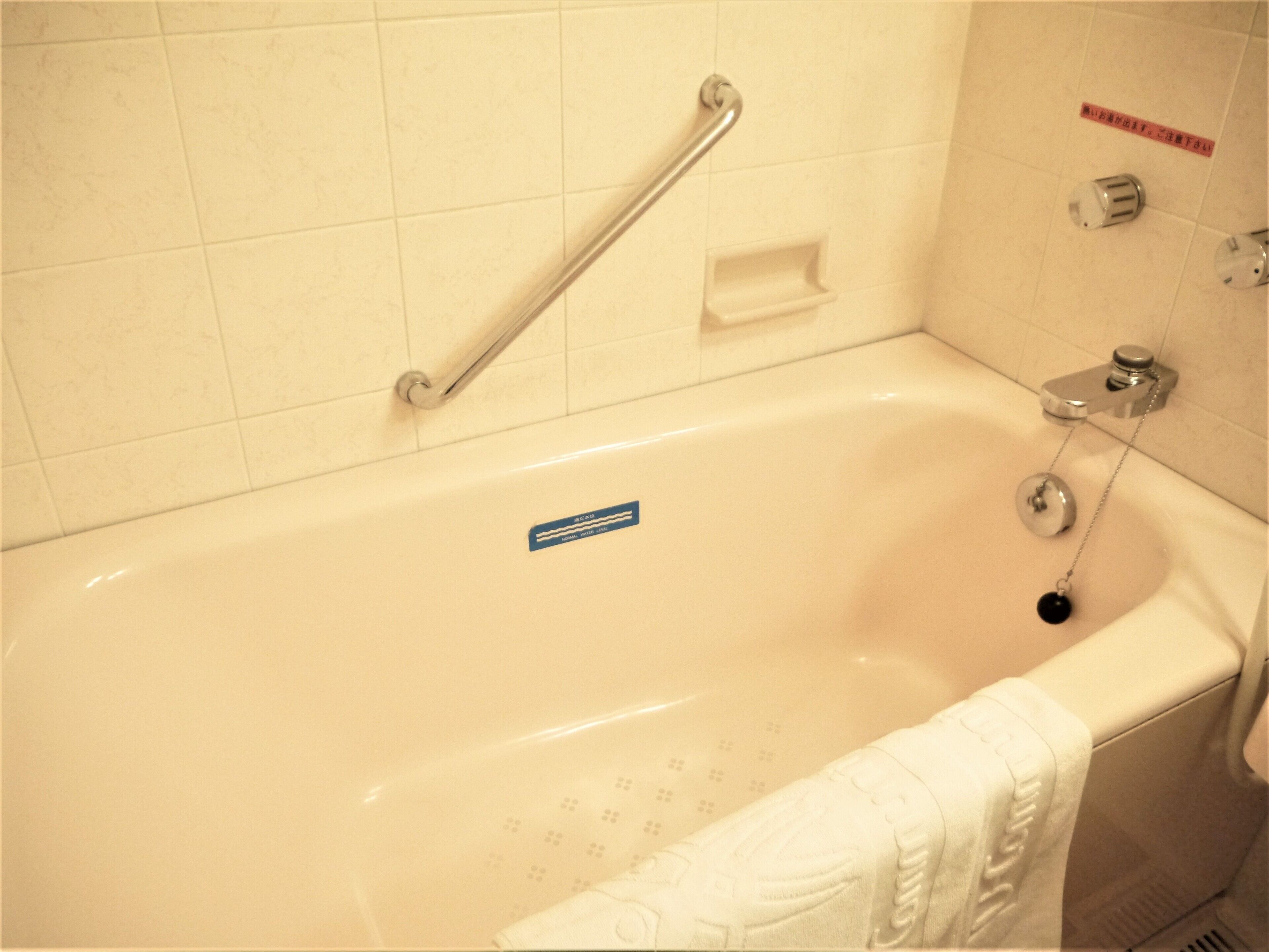 combined shower/bathtub, free toiletries, hair dryer, bathrobes