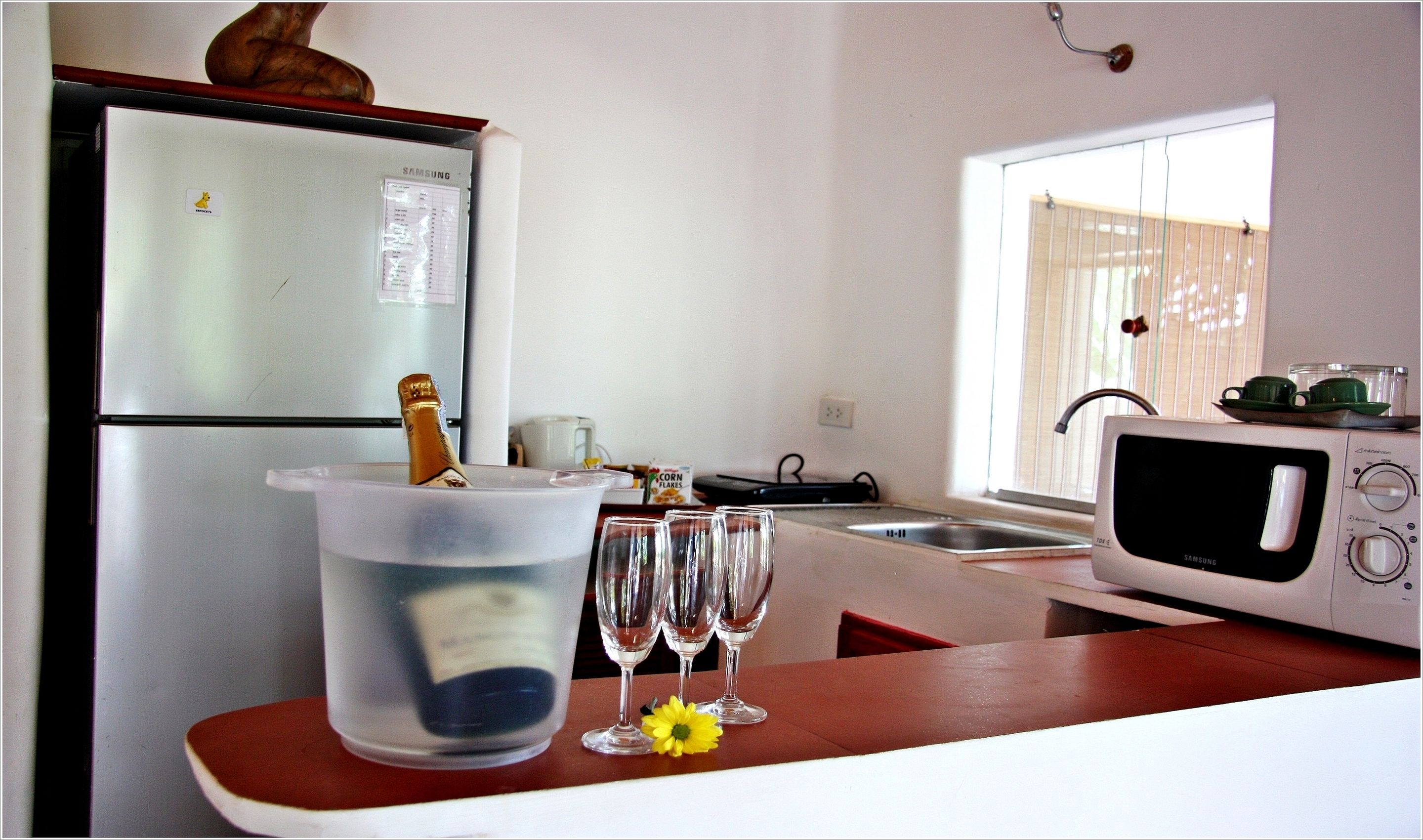 deluxe suite | private kitchen | full-sized fridge, microwave, coffee/tea maker