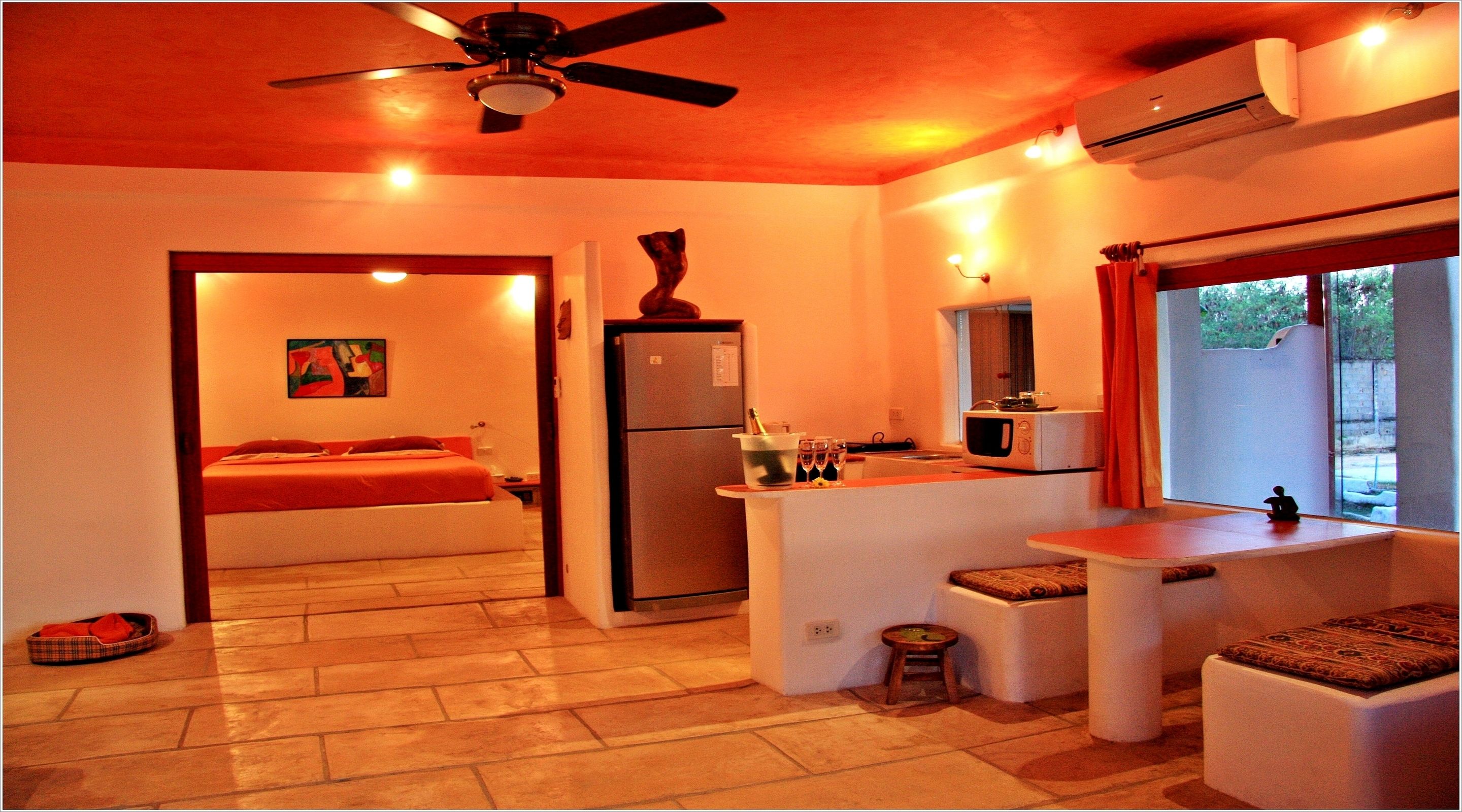 deluxe suite | living room | 42-inch lcd tv with satellite channels, tv