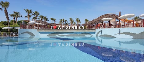 Indoor pool, seasonal outdoor pool, pool umbrellas, sun loungers