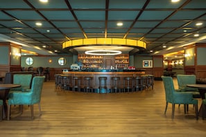 4 bars/lounges, poolside bar, beach bar
