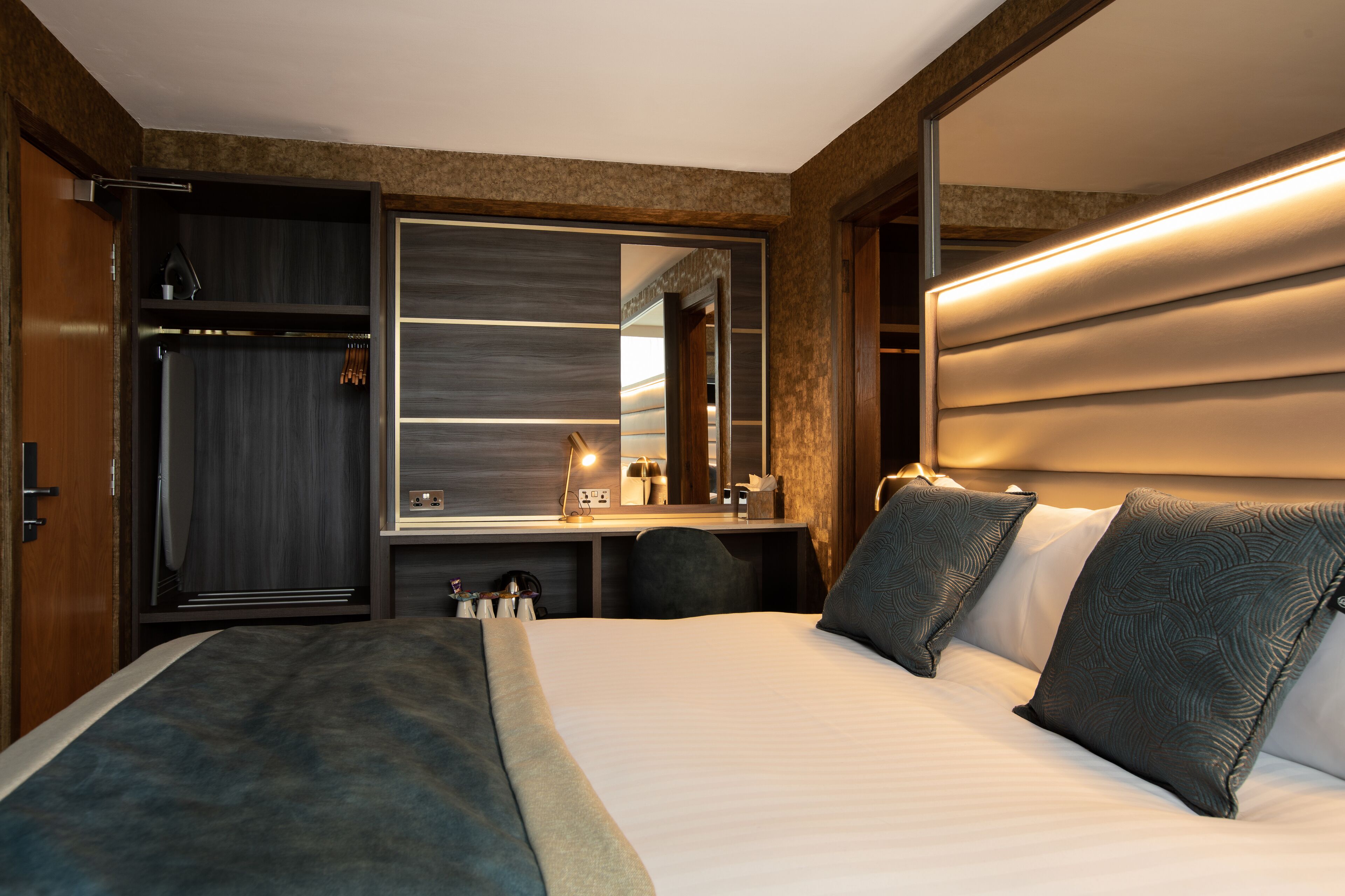 desk, laptop workspace, blackout curtains, iron/ironing board