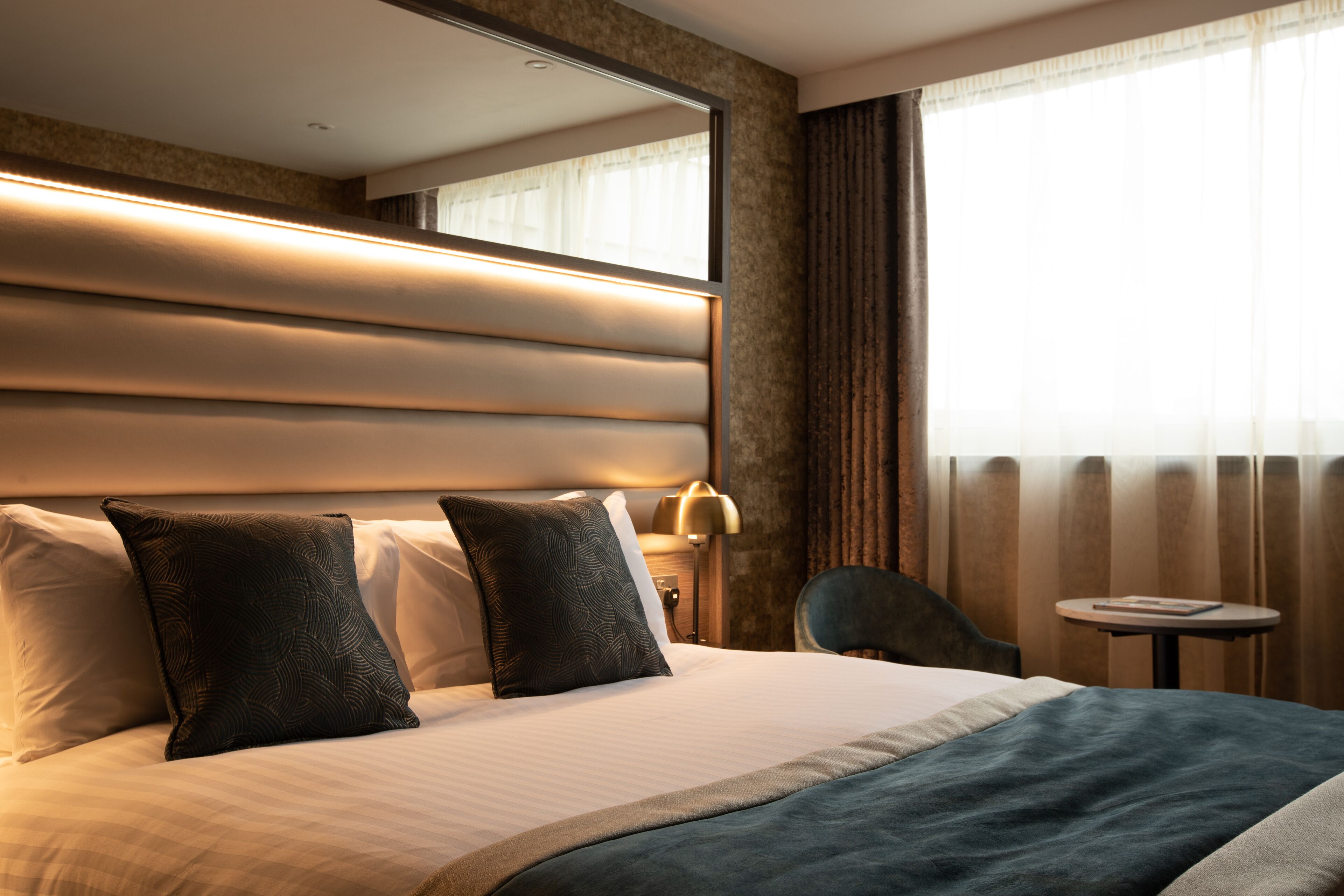 Desk, laptop workspace, blackout curtains, iron/ironing board