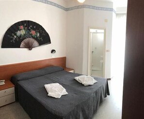 Desk, free WiFi, bed sheets