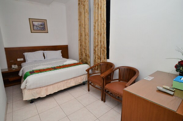 Habitación Deluxe con 1 cama matrimonial o 2 individuales | Wifi gratis y ropa de cama 