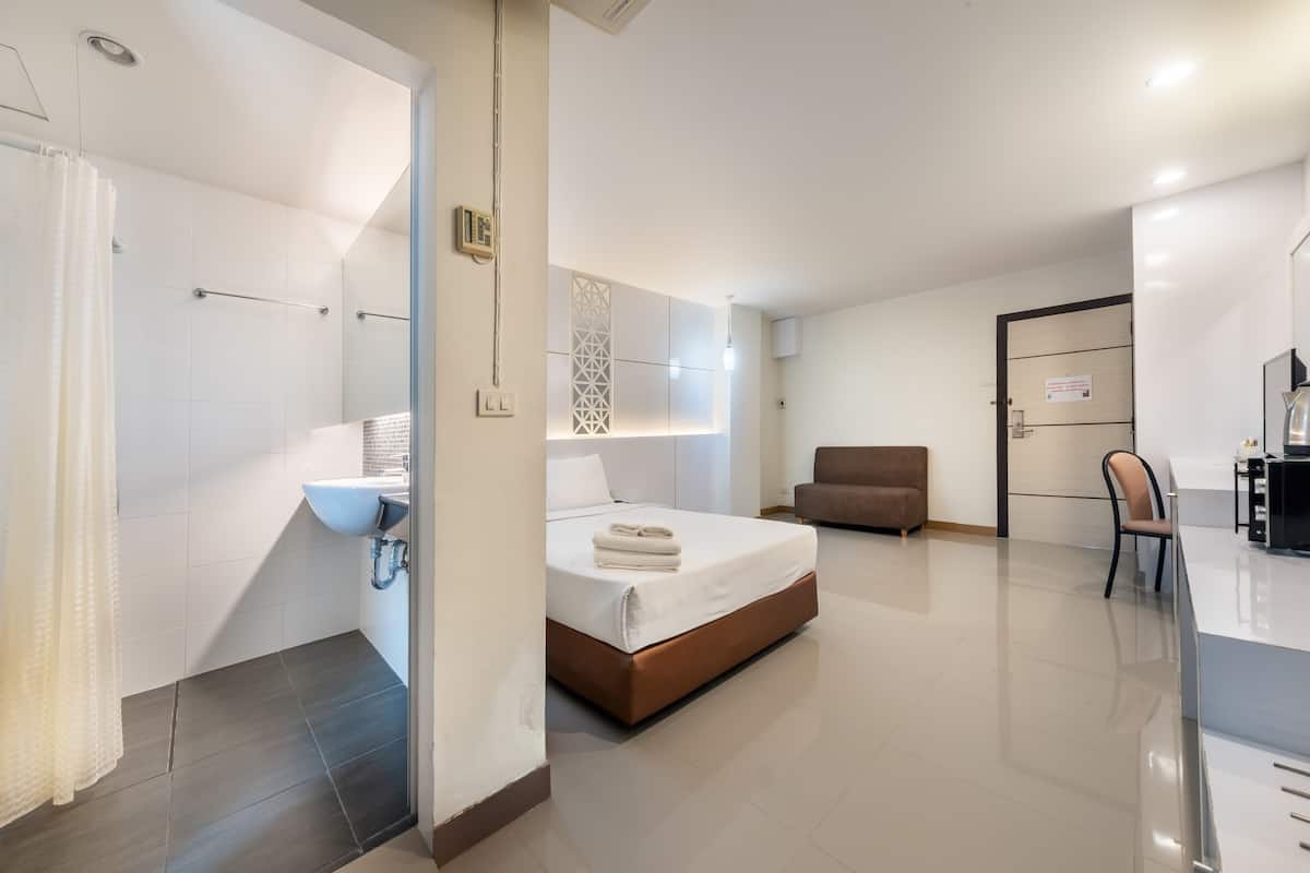 Superior kamer, 1 twee- of 2 eenpersoonsbedden | 1 slaapkamer, luxe beddengoed, een minibar, een kluis op de kamer