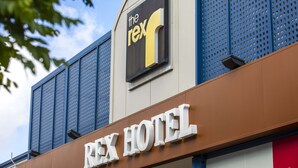 A hotel sign with the name "Rex Hotel" and a logo above it. - Nightcap at Rex Hotel (Marleston)