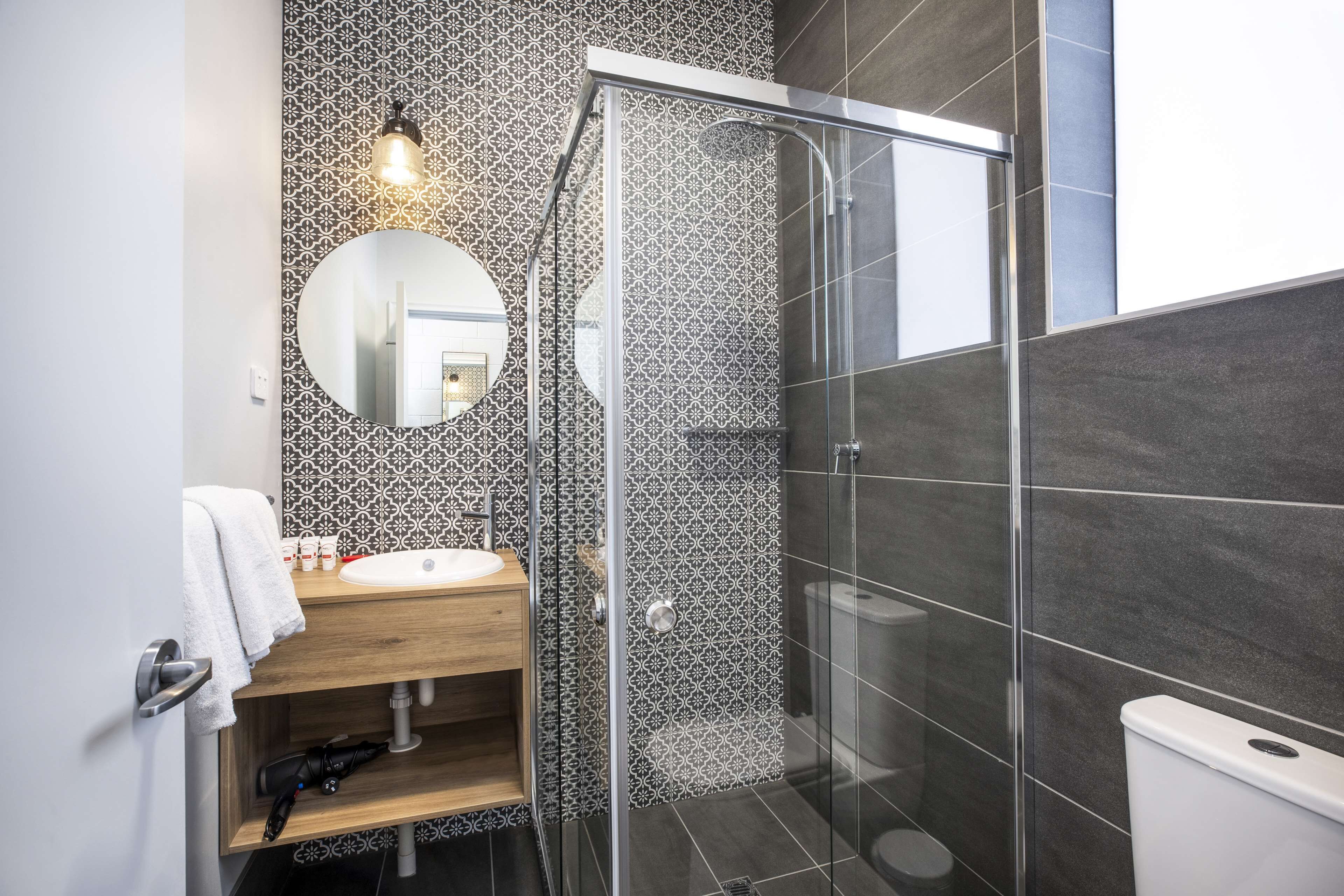 studio queen  | bathroom | shower, free toiletries, towels
