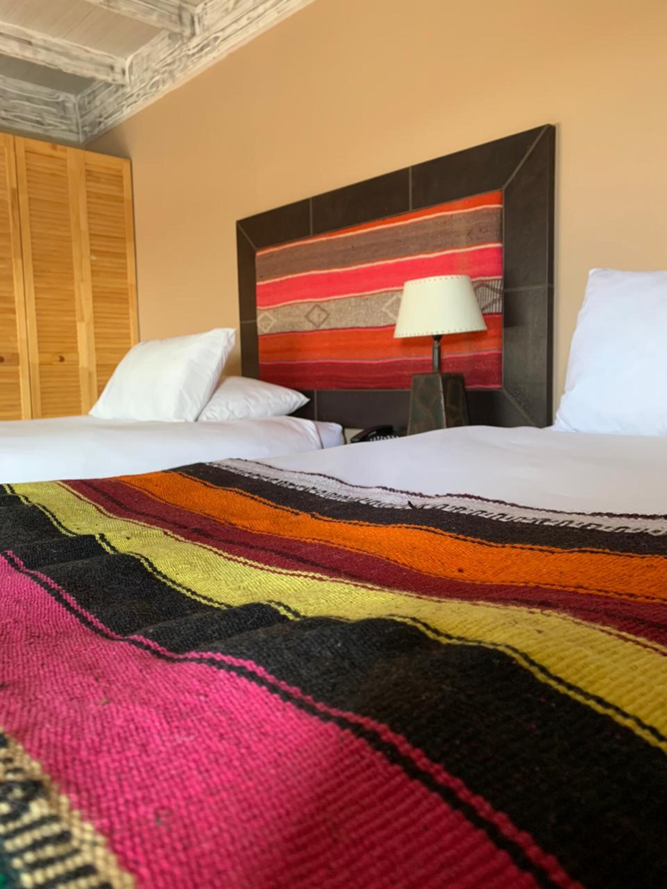 deluxe twin room | minibar, in-room safe, individually decorated, individually furnished