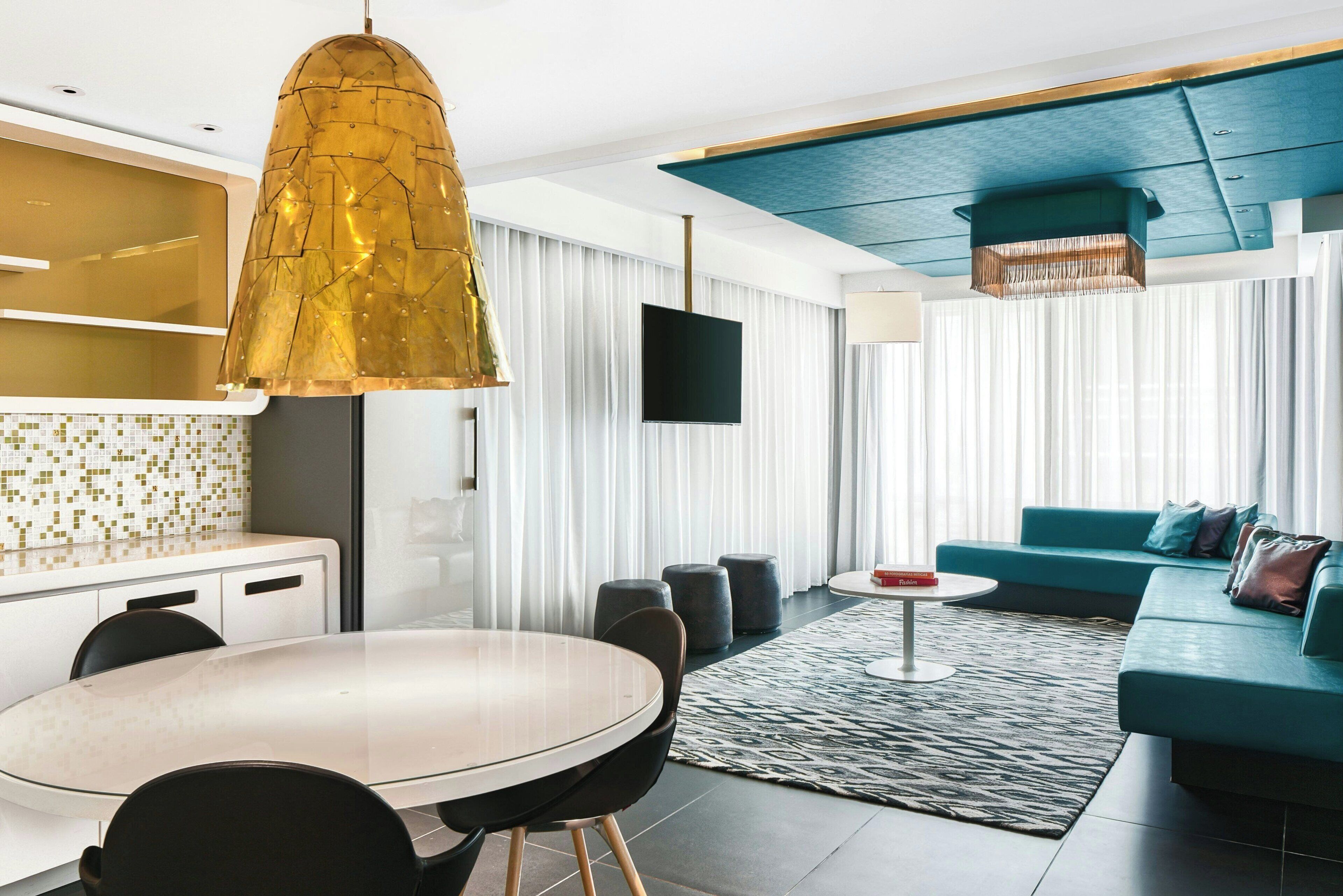 Penthouse II | Living room | 42-inch flat-screen TV with cable channels, TV, iPod dock