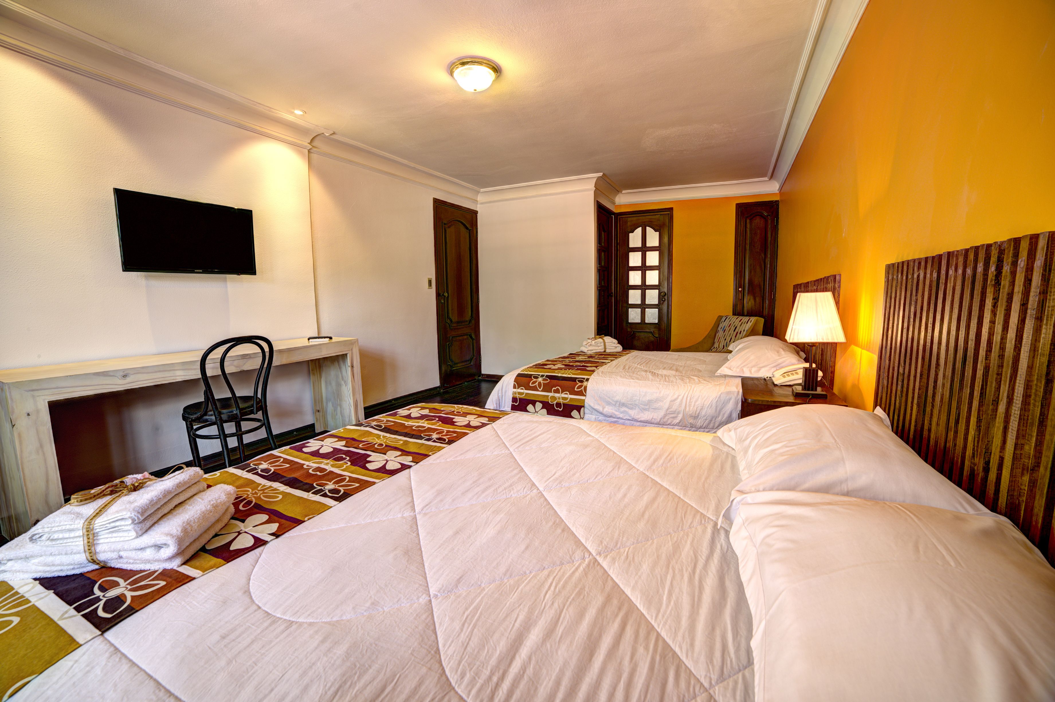 family room toscana | premium bedding, minibar, in-room safe, individually decorated
