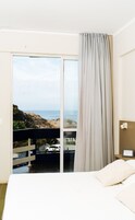 Double or Twin Room, Sea View | Minibar, in-room safe, blackout drapes, free WiFi