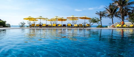 Indoor pool, outdoor pool, pool umbrellas, pool loungers