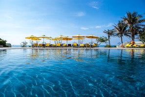 Indoor pool, outdoor pool, pool umbrellas, sun loungers
