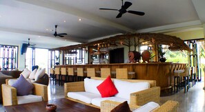 Cocktail bar, beach views, open daily