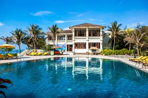 Indoor pool, outdoor pool, pool umbrellas, pool loungers