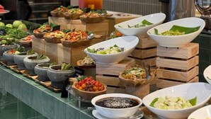 A buffet with various dishes, including salads, fruits, and a sushi bar. - Crystal Crown Kuala Lumpur (Kuala Lumpur)