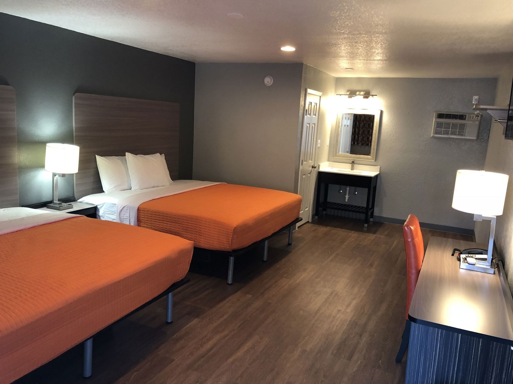 Premium bedding, desk, laptop workspace, free WiFi