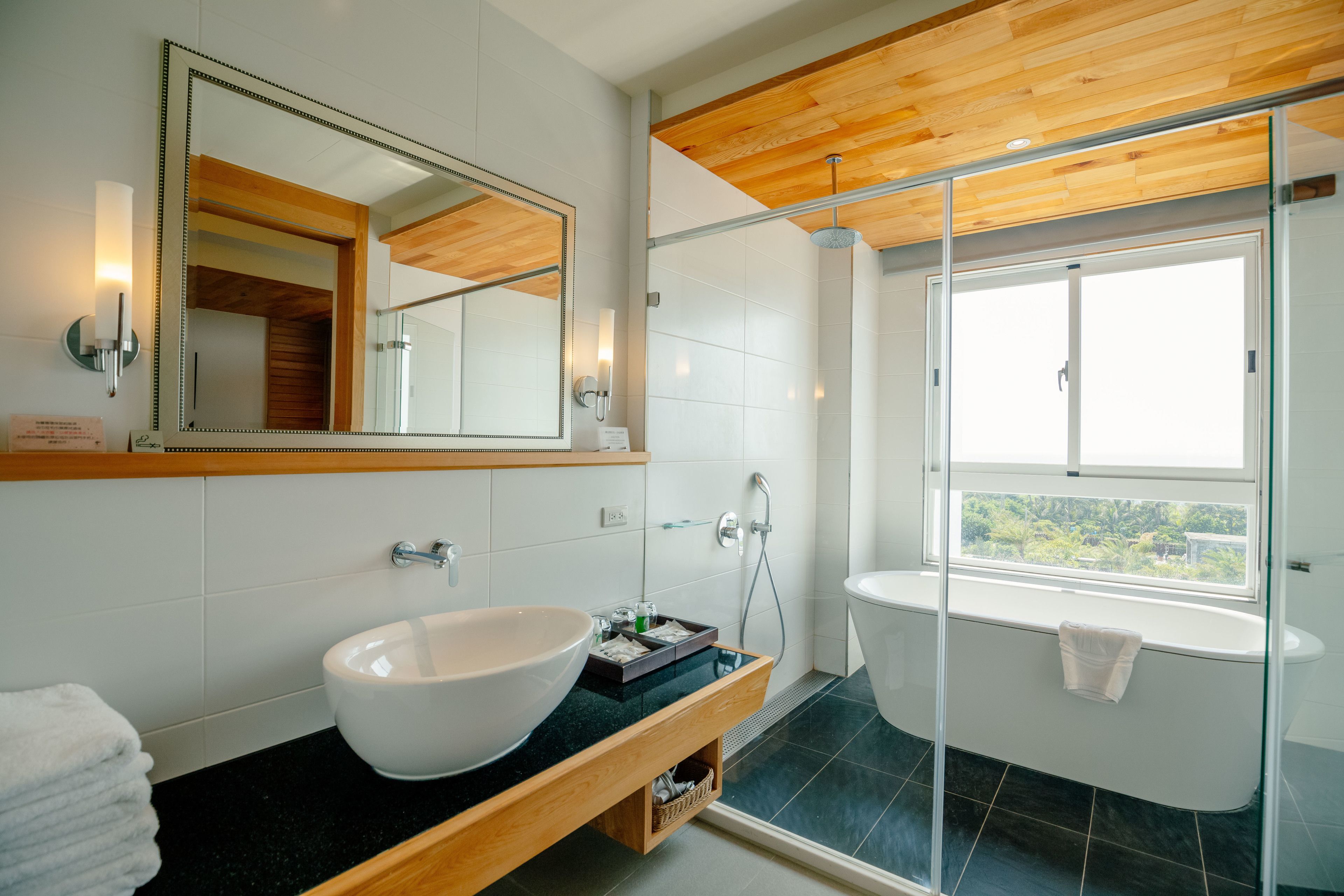 separate bathtub and shower, deep-soaking bathtub, free toiletries