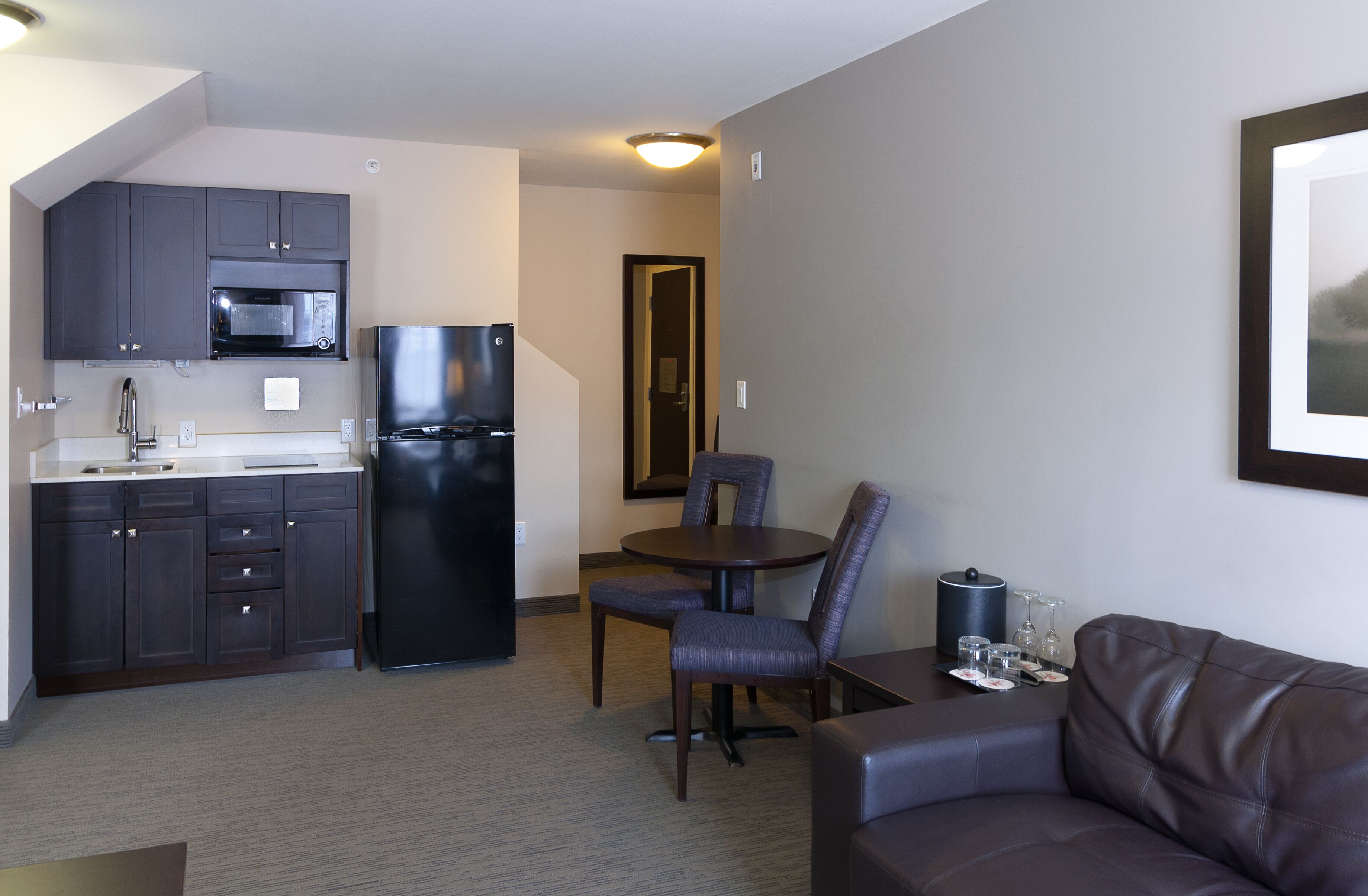 family room, 2 bedrooms | private kitchen | mini-fridge, microwave, coffee/tea maker, electric kettle