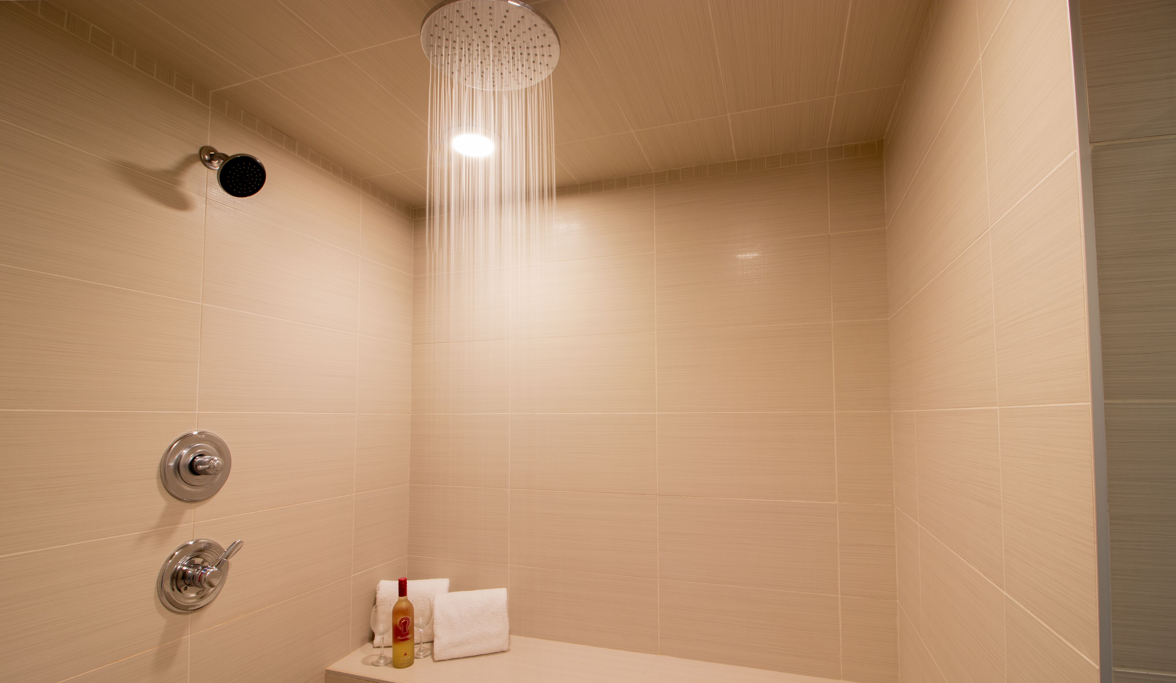 suite, 1 king bed, jetted tub | bathroom shower