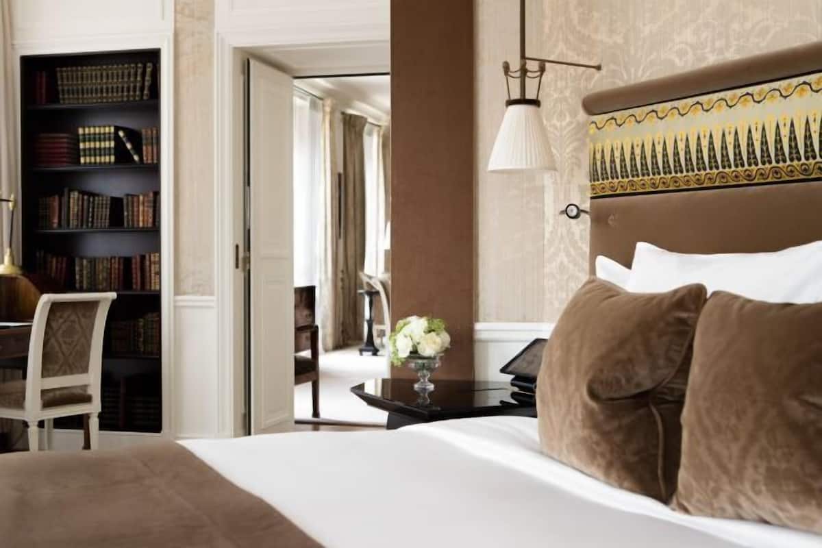 Premium bedding, down duvets, free minibar items, in-room safe