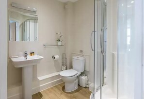 Shower, eco-friendly toiletries, hair dryer, towels