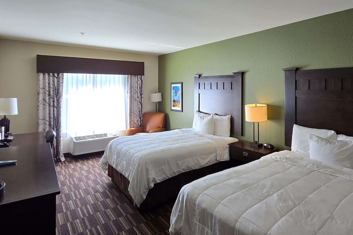 Premium bedding, desk, blackout drapes, iron/ironing board