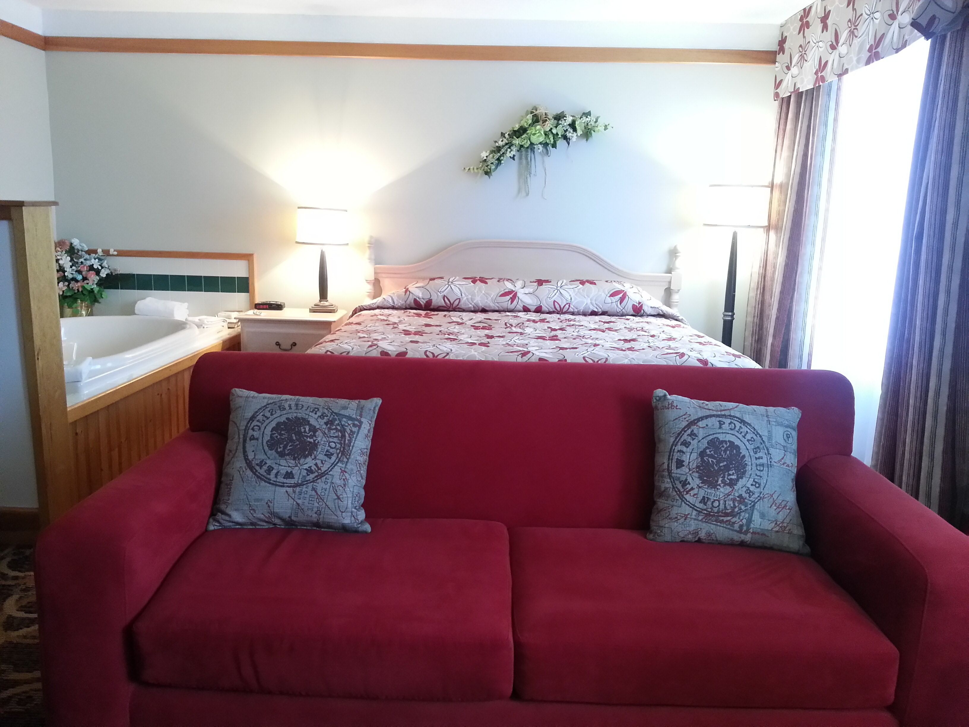 suite, 1 king bed with sofa bed | living area | 32-inch tv with cable channels