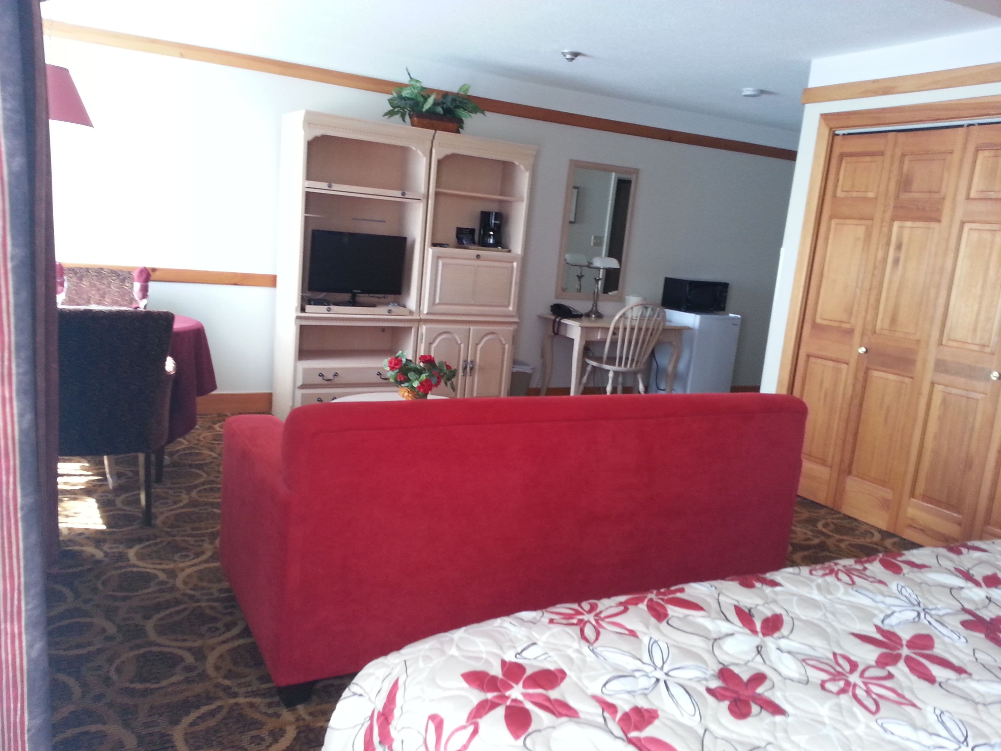 suite, 1 king bed with sofa bed | living area | 32-inch tv with cable channels