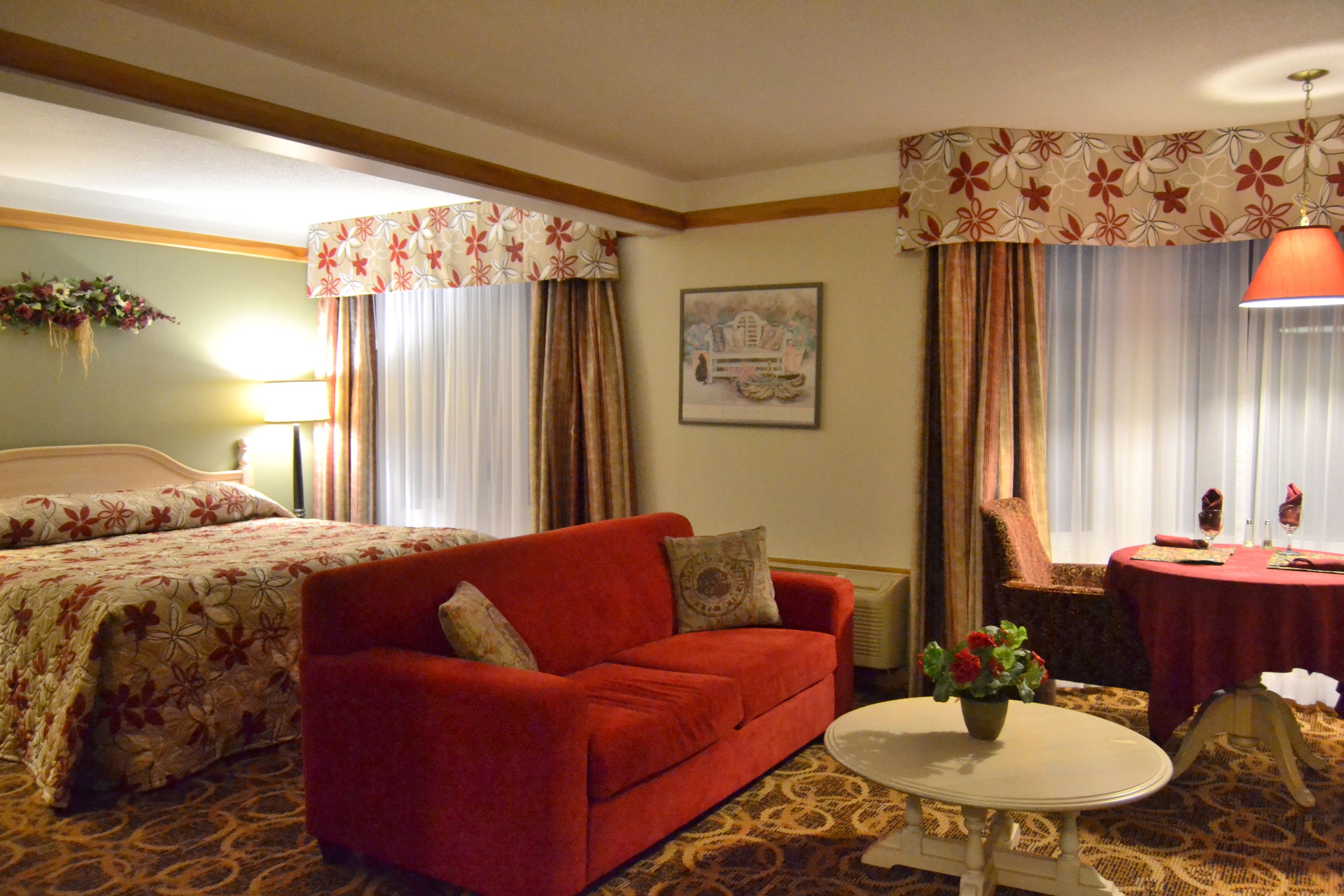 suite, 1 king bed with sofa bed | living area | 32-inch tv with cable channels